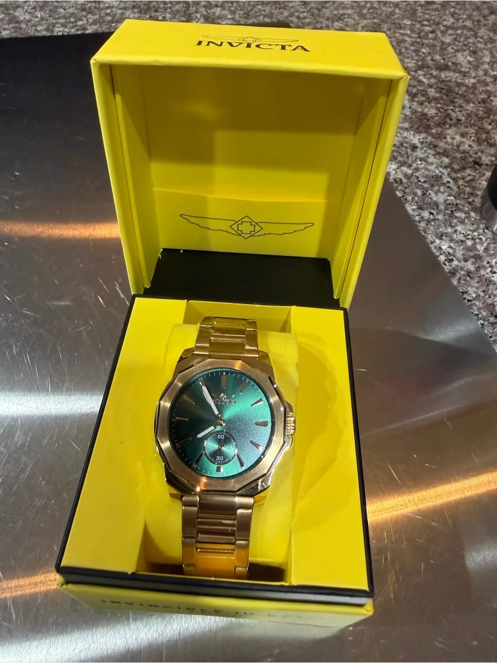 Invicta Gold Tone Watch with Blue-Green Dial